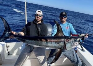 Captain Mike Dupree holding a swordfish
