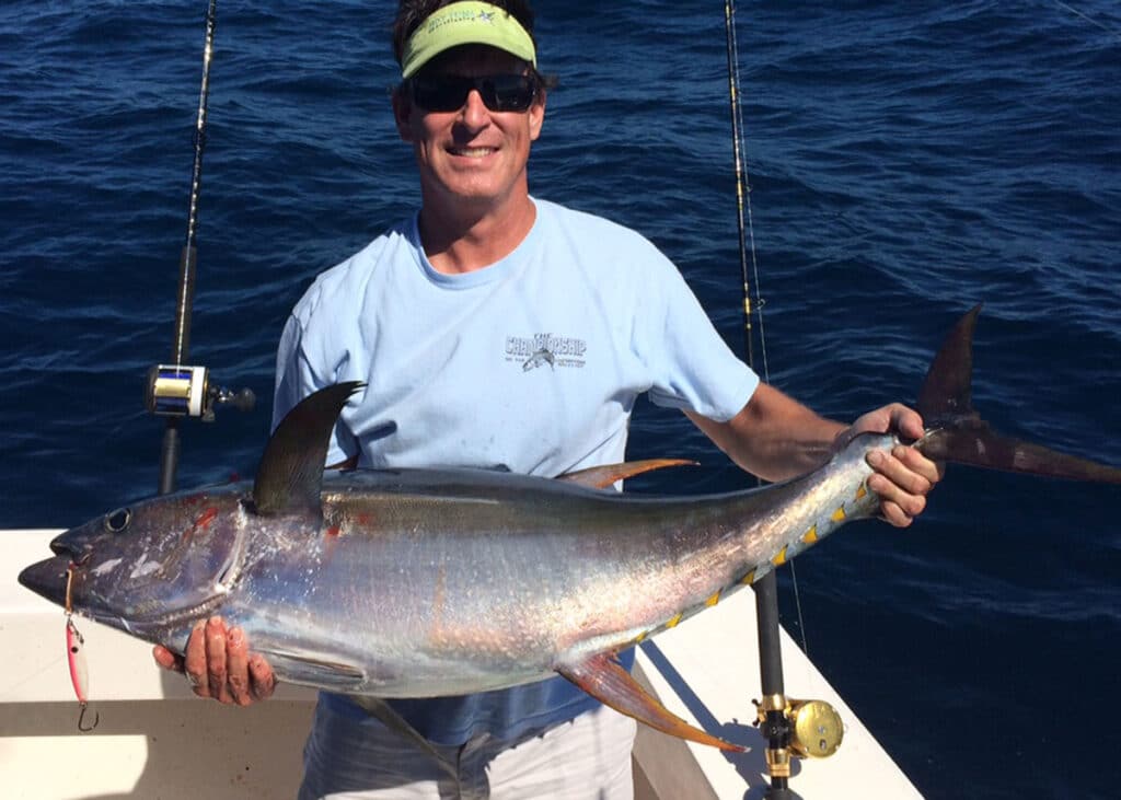 man holding large yellowfin