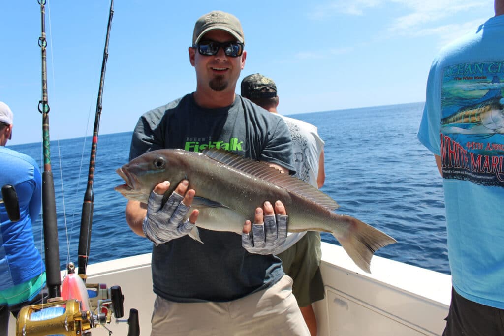 Angler poses with a blueline tilefish.